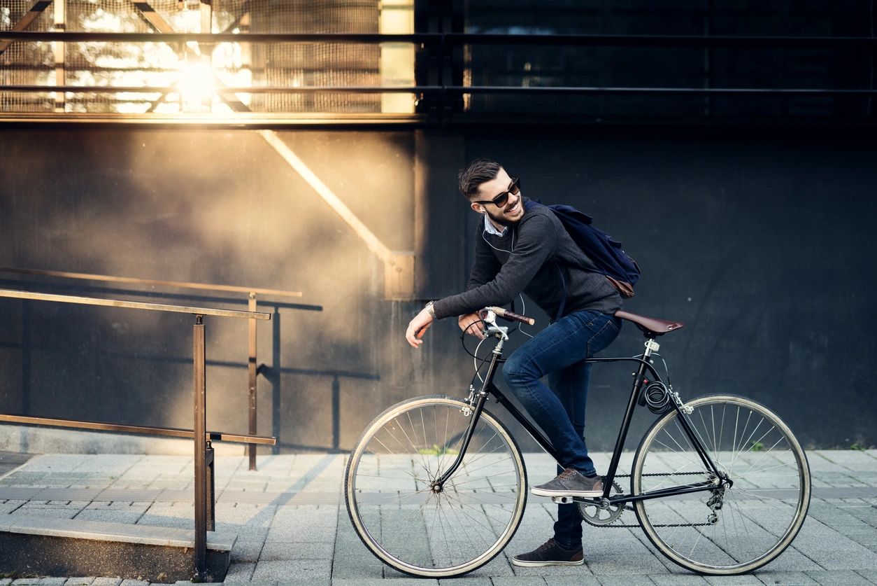 Stylish cyclist in urban setting